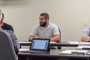 Brandon Strasser was sworn in as a new water board trustee on Monday.