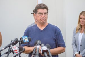 Rob Tibbitts addresses the media at a press conference on August 3rd, 2018.