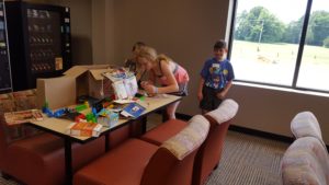 Computer Camp attendees designed race tracks for their hexbugs to follow to a determined location while meeting all of the constraints. (Photo provided by Breanne Garrett, Computer Camp 2017)