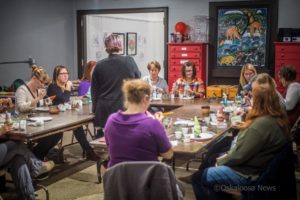 A group of Mahaska Young Professionals spent Monday evening painting their own garden gnome.