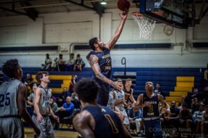 Omar Sherman delivers 2 of his 35 points on Saturday against Shawnee State.