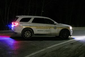 A Mahaska County Sheriff's squad car blocks traffic along 163 during Wednesday evenings fatal accident.