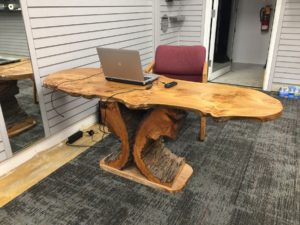This desk is now inside the Oskaloosa News office, and is a functional work of art made by Patterson.