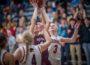 Ashley Drost gets the rebound and the putback against Grinnell on Friday night.