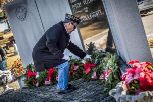 The Oskaloosa American Legion placed wreaths at the War Memorial inside Forest Cemetery on Saturday.
