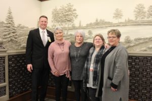 Shown after presenting Lois Williams’ estate check to Mahaska Hospice are, from left: Mahaska Health CEO Kevin DeRonde; Williams’ daughters Shirley Peiffer and Mary Beth Northcutt, Hospice Coordinator Kim Stek, and Mahaska Health Foundation Director Cathy Stahl. (submitted photo)