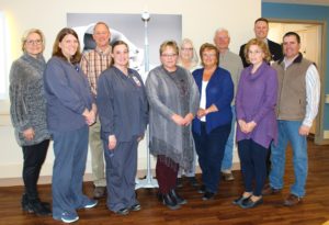 Shown in the Mahaska Health Birthing Center with the new phototherapy system used to treat babies with jaundice are, from left: Foundation Board President Sandy Baily, Nurse Sara Lenox, Foundation Secretary Andy Holmberg, Nurse Amanda Ridgeway, Foundation Director Cathy Stahl, Foundation Board members Shirley Vore, Vicky Collette, Guy Vander Linden and Dede Horn, Mahaska Health CEO Kevin DeRonde, and Foundation Treasurer Josh Buckingham. 