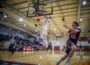 Making his momma mad, Cole Henry dunks the ball against Grinnell on Wednesday night.