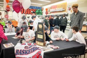 Oskaloosa basketball state champs were signing autographs and having breakfast with fans at Hy Vee on Saturday.