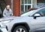 Vincent Provenzano (left) greets individuals as they drive by, honk, and wish Vincent well.