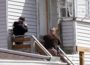 Law enforcement with their weapons drawn during a barricade incident in Oskaloosa this morning.