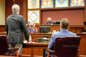 Mahaska County Supervisor Mark Groenendyk (seated right) was in court Monday for sentencing after pleading guilty to assault.