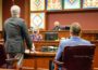 Mahaska County Supervisor Mark Groenendyk (seated right) was in court Monday for sentencing after pleading guilty to assault.