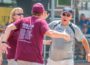 Oskaloosa Head Coach Jay Harms (right) with his wife Linda (left) just after winning a sate title.