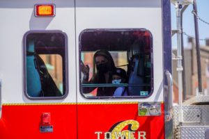 Bentley DeGeest riding in Oskaloosa's 'Tower 6' on Saturday. A procession of emergency vehicles transported him to his birthday party.