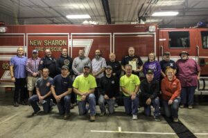 Members of the New Sharon Fire Department, and various first responders and retired first responders pose after receiving recognition this past week.
