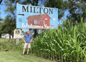 Dave Miglin, of West Des Moines, at Milton, one of the 955 Iowa towns and cities he visited over a five-year period. (photo submitted by Dave Miglin)
