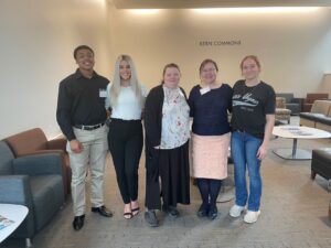 Pictured left to right: Jayqwon Bridges, Mackenzie Roberts, Abigail Karr, Dr. Brooke Sherrard, and Ashleigh Denny on April 23 at the Iowa Human Rights Research Conference at Drake University Law School in Des Moines