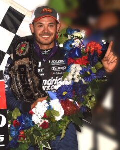  Kyle Larson celebrates his win at the Front Row Challenge in Oskaloosa Monday (Paul Arch Photo)