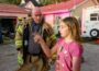 Oskaloosa Fire Chief Scott Vaugh listens as Lily Woods describes what she saw before she called 911.