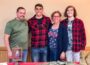 Andrew O'Day (tall middle male) with his family on Sunday as he said good-bye to the Oskaloosa community.