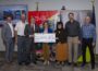 Pictured left to right: Michael Wagler, Main Street Iowa Coordinator; Jim Bruxvoort, Owner of H&R Block; Dave Krutzfeldt, Mayor of Oskaloosa; Amy Brainard, Oskaloosa Main Street Director; Debi Durham, IEDA & IFA Executive Director; Dr. Eric DeBoef, Owner of Town Square Dental Care; and Cary Van Kampen, Oskaloosa Main Street Board Member.