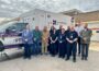 Mahaska County Board of Supervisors with staff from Mahaska Health in front of their new ambulance.
