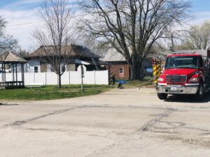 Oskaloosa Fire Department finishes up operations at a house fire in Rose Hill in April 2023.