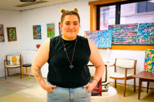Lauren Terrell in the gallery at Studio Osky.