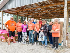 Mahaska Health team members and community volunteers work together at the Southern Iowa fairgrounds on the second Monday of each month to lead the Food Bank of Iowa mobile food pantry. This initiative helps families in need of food assistance across the state of Iowa.