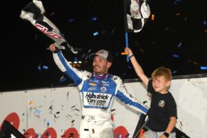 Kyle Larson does a wing dance with son, Owen, after winning his second career Knoxville Nationals Saturday (Paul Arch Photo)