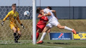 Two Own Goals Keep Statesmen Undefeated, Drop Friends 3-1