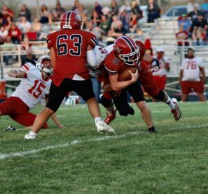 RD Keep/NM Communications Photo Kaleb Stout rambles for a few yards against Central Decatur. Stout rushed for 44 yards. 