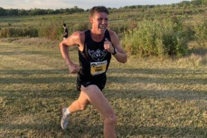 The Indian Hills Men's Cross Country squad made a statement on Friday night with a dominant showing at the Hawkeye Invitational hosted by the University of Iowa. The Warriors were led by a pair of school-record performances and six personal best efforts.