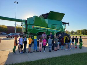 It was a beautiful, sunny morning at the Oskaloosa Elementary School for 150 third graders to see the combine that area farmer Jerry DeBruin with DBGL Inc. brought to the school.