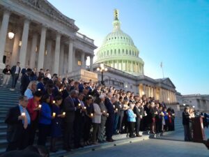 Members of Congress gather on the steps of the U.S. House of Representatives on Thursday, Oct. 12, for a candlelit prayer vigil and moment of silence honoring the victims of the Hamas attacks on Israel. (Photo by Ashley Murray/States Newsroom)