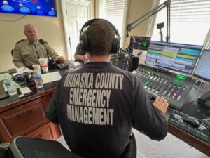 Mahaska County Sheriff Russ Van Renterghem and Mahaska County Emergency Management Coordinator Josh Stevens take their turn at Blue Christmas. (photo submitted)