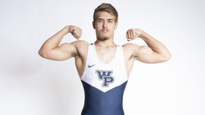 Braden Peglow poses for a staged photo in the Athletic Communication Office on Wednesday, Oct. 18, 2023. (Photo by Jordan Lester/William Penn Athletics)