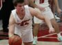 Ryan Andersen pulls down a rebound and races toward a basket against BGM as teammate Nate Sampson looks on. Andersen scored 20 points in an 88-35 win over the Bears.