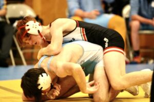 RD Keep/NM Communications Photo

Ryan Groom works on Lynnville-Sully’s Kendric Johnson en route to a 14-0 major decision. 