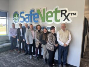 Nebraska state Sen. Jana Hughes of Seward, center right, proposes partnering with Iowa nonprofit SafeNetRx to get safe, non-expired donated medications back to Nebraska. Multiple Nebraskans toured the facility Oct. 30. From left to right, Hughes’ legislative aide Matt Howe, Matthew Schaefer of Mueller Robak, State Sen. Merv Riepe of Ralston, SafeNetRx CEO Jon Rosmann, Hughes, Nebraska Pharmacists Association Haley Pertzborn and Amy Holman, and Iowa Rep. John Forbes, D-Urbandale. (Photo courtesy of Sen. Jana Hughes)