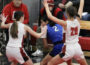 RD Keep/NM Communications Columbus Community’s Arianna Vergara was smothered by North Mahaska defenders Aly Steil, left, and Kayla Readshaw (20). Vergara was held to eight points as No. 14 North Mahaska moved to the Class 1A regional final with a 61-22 win.