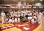 Ottumwa, IA – For the 19th time in program history, the Indian Hills Men's Basketball team punched its ticket to the National Junior College Athletic Association (NJCAA) DI Men's Basketball National Tournament after winning the 2024 NJCAA North Central District Championship Saturday night. The Warriors defeated No. 20 North Dakota State College of Science 90-74 at the Hellyer Center. The Warriors claimed their 17th all-time NJCAA District Championship after running past the Wildcats with a dominant showing on the hardwood Saturday night, the team's 11th consecutive victory heading into the national tournament. The Warriors advance to the national tournament for the third consecutive year and ninth time in the last 10 seasons. Indian Hills will learn its national tournament seed and opponent Sunday night via the NJCAA Selection Show via the NJCAA Network at 6:00 PM Sunday night. Warrior fans are invited to join head coach Josh Sash and the team at the Hellyer Center as the team awaits its seed in Hutchinson, KS. The Warriors were led by sophomore guard TJ Morris (Queens, NY/Northeastern Oklahoma A&M) on Saturday with 19 points, including a perfect 7-7 at the free throw line. Morris was joined in double-figures by Chris Mpaka (Kinsasha, Congo/Frank Phillips) who posted 14 points and six rebounds to go along with four blocks. Braden Sparks (Villa Rica, GA/Mercer) tacked on 11 points while Davontae Hall (Chicago, IL/Hyde Park) and Trevion LaBeaux (Waterloo, IA/Ames) added 10 apiece. LaBeaux made his return to the hardwood Saturday night after missing the previous three contests due to an injury. The sophomore sparked the team on both ends of the court and grabbed a team-high eight rebounds for the Warriors. Indian Hills handed the Wildcats just their second defeat of the season as the No. 20 nationally ranked program fell to 31-2 on the year. The 90 points scored by the Warriors were the most allowed by NDSCS, a team that ranked third in the nation with 62.5 points per game allowed. Indian Hills connected on 49.2 percent of its shots, including 50.0 percent (9-18) from three-point range. As a team, the Warriors went 23-27 at the charity stripe, the team's third consecutive game shooting at least 84 percent from the line while making at least 16 free throws. The Warriors controlled the opening tip on Saturday night and never looked back. Playing in front of its home crowd for the sixth consecutive contest, the Warriors never trailed in the opening half and built its lead to double-digits late in the first frame as Morris tallied 11 points through the first 20 minutes of action. The Wildcats clawed back to within eight on multiple occasions throughout the early goings of the second half, but it was all Indian Hills down the stretch as the home team carried out its 11th consecutive win. The Warriors shot 53.8 percent from the floor in the second half alone and went 16-18 from the stripe over the final 20 minutes. Sparks facilitated the Warrior offense with a game-high six assists while grabbing a season-high seven boards for the Warriors. One of the most historic programs in junior college basketball, the Warriors will make the trek to Hutchinson, KS as one of 16 automatic qualifiers with the District title. The 24-team field gets underway Sunday, March 24 from the Hutchinson Sports Arena, a court where the Warriors have captured three national championships and 29 victories all-time.