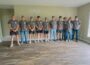 Members of the Oskaloosa Buildings and Trades program stop for a group picture at their most recent open house.