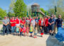 Volunteers, Contributors, City of Oskaloosa Staff, and Oskaloosa Chamber Diplomats cut the ribbon on the new Edmundson Playground.