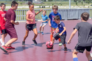 Oskaloosa youth soccer players took advantage of the Musco Mini-pitch system recently, while getting the chance to meet members of the Des Moines Menace Soccer Club.