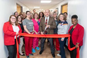Mahaksa Healthcare Teams, Chamber of Commerce Members and Dr. Pargulski, ready to cut the ribbon