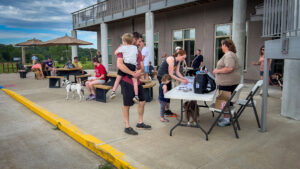 More than a dozen individuals and their dogs took part in the start of the Mahaska County BARK Program.
