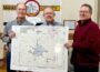 Chris Hyland, Musco VP CFO, Frank Hansen, MCG Director of Business Development, and Mark Groenendyk, County Supervisor, are showing the Fiber Construction Build Map for Mahaska County. This map is on display at the Oskaloosa MCG Office or on the website https://www.mahaska.org/rural-mahaska-fiber. If you visit this website link, you will find the Mahaska County build map. There is an option for you to type in your address to find out the tentative timeline for when MCG's fiber construction will be complete in your area.