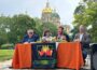 From left to right, Chris Schwartz, Giselle Bruskewitz, Tommy Hexter and Aaron Lehman speak July 1, 2024 outside the Iowa Capitol about a coalition called Setting the Table for All Iowans. (Photo by Jack O’Connor/Iowa Capital Dispatch)